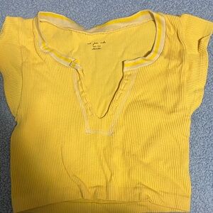 Yellow button up top